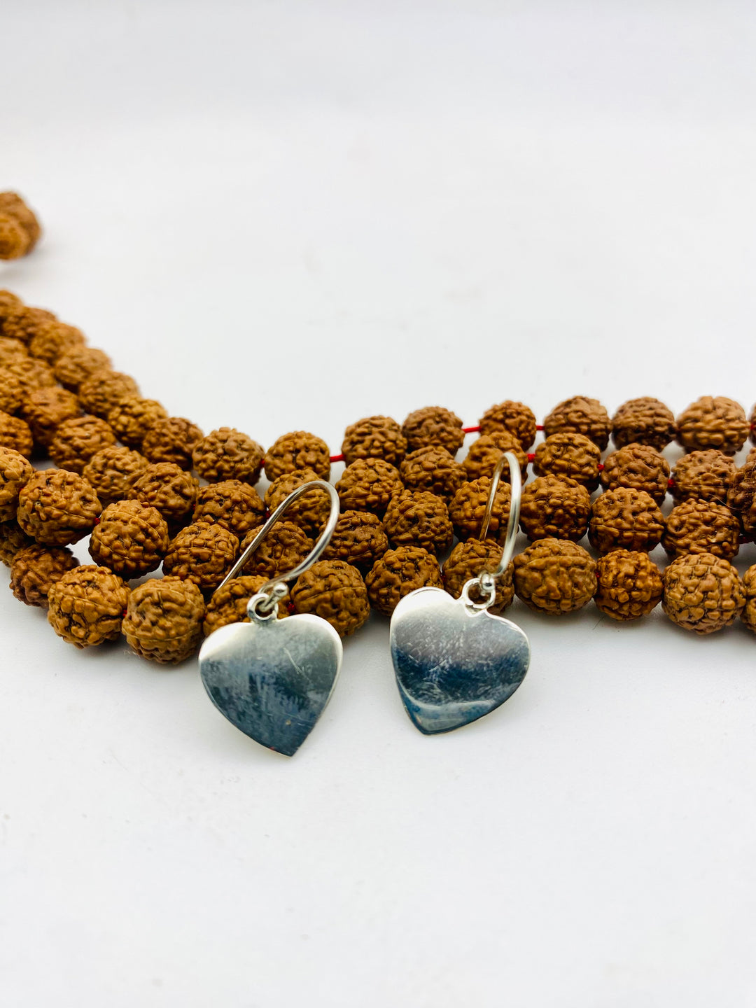 Radiant Silver Heart Earrings