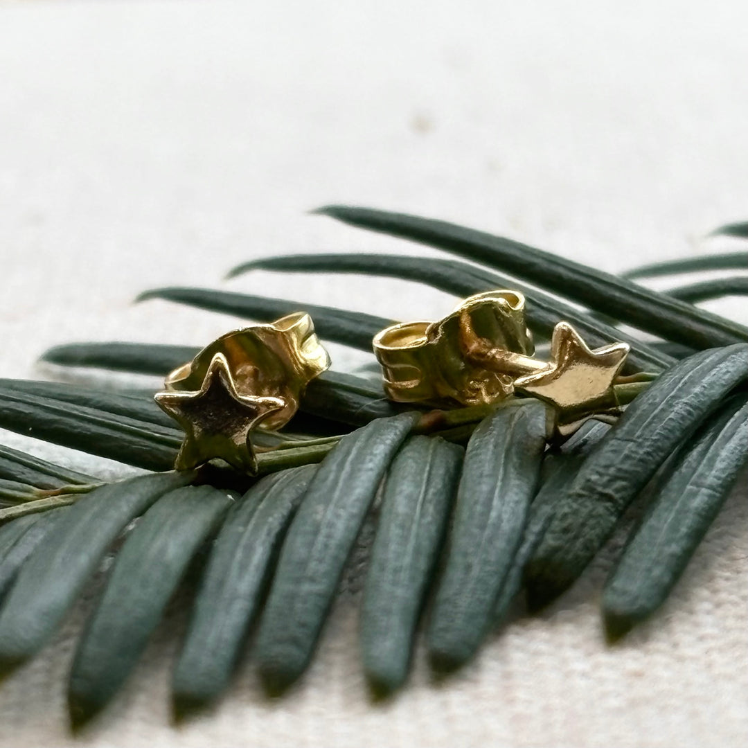 Gold plated sterling silver tiny star stud earrings