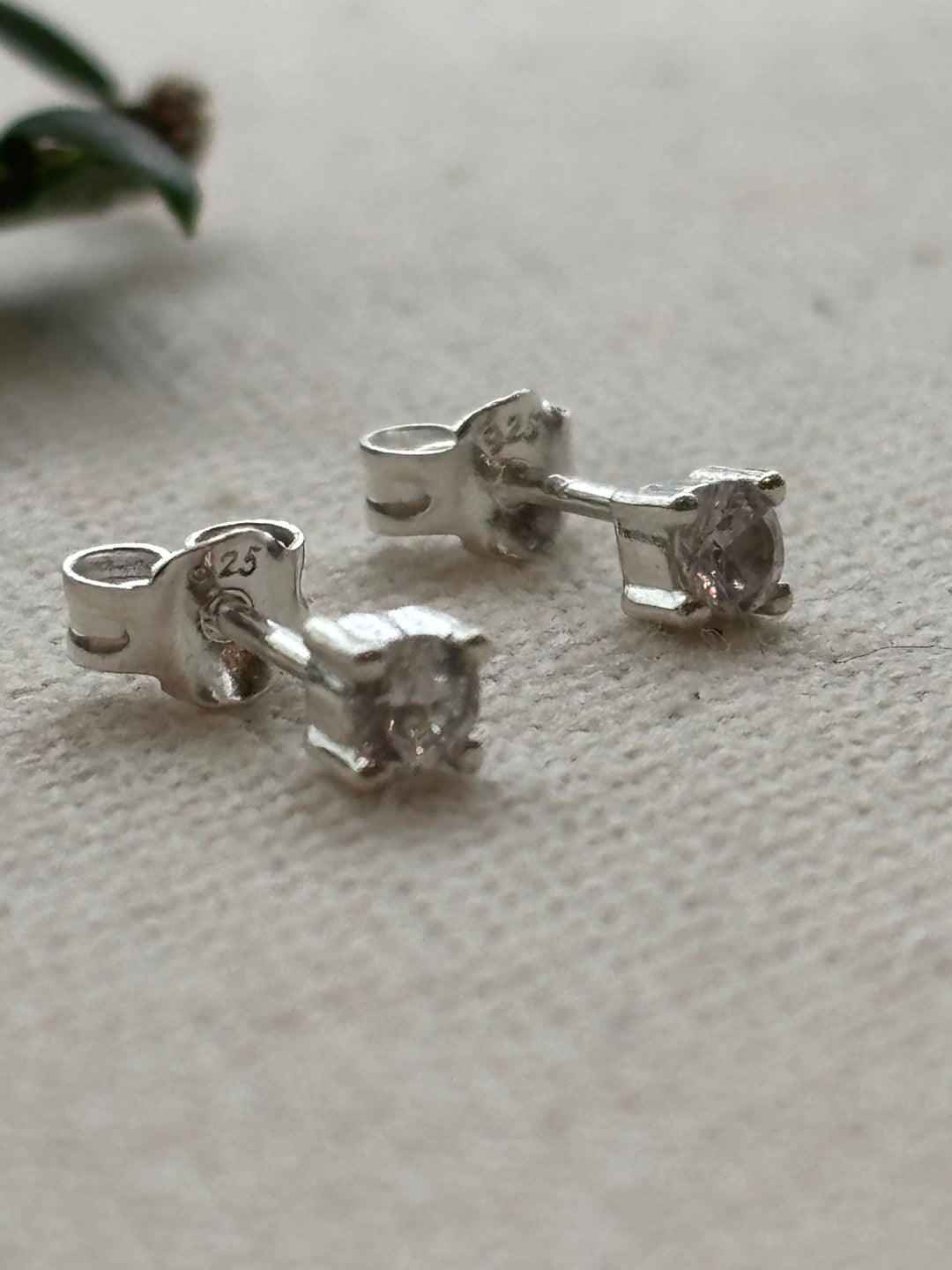 Sterling silver tiny cubic zirconia stud earrings