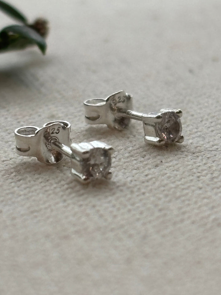 Sterling silver tiny cubic zirconia stud earrings