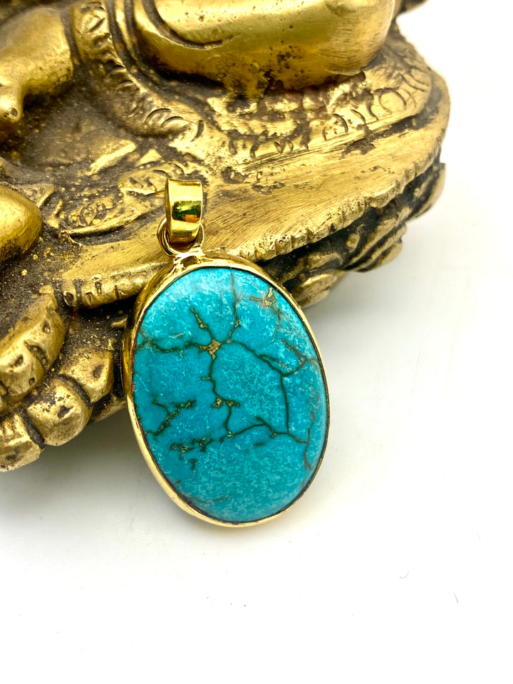 Held by the Blue Pendant