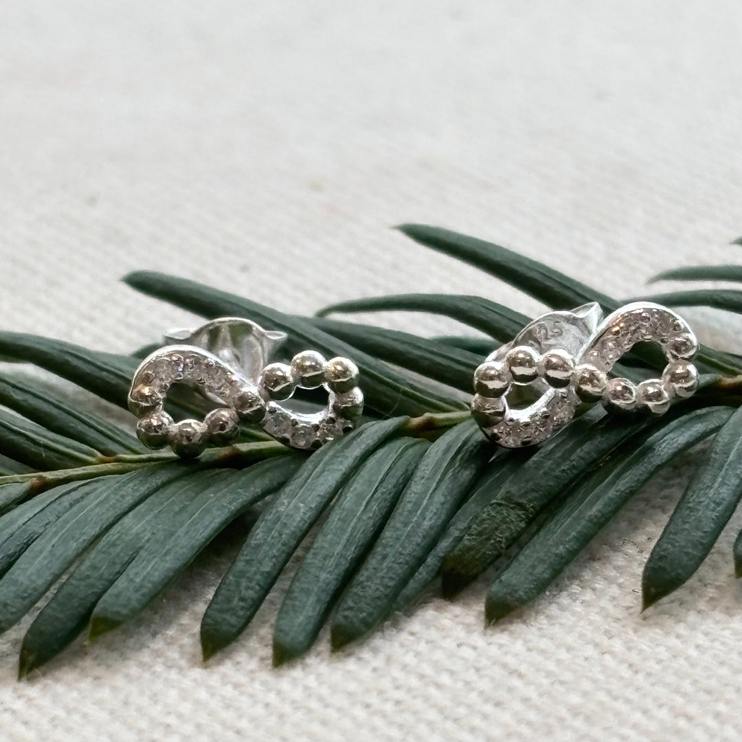 Sterling silver infinity stud earrings