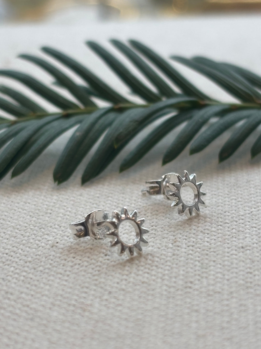 Sterling silver sun stud earrings
