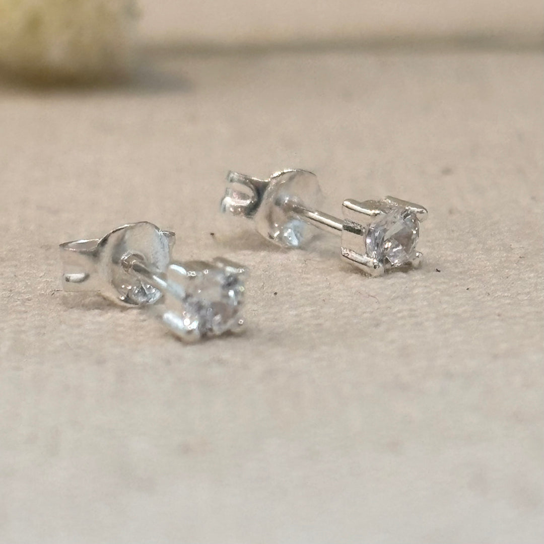 Sterling silver tiny cubic zirconia stud earrings