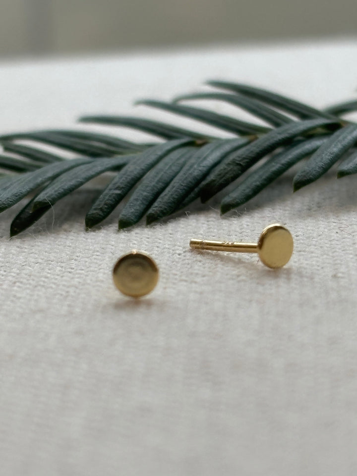 Gold plated sterling silver tiny disc stud earrings