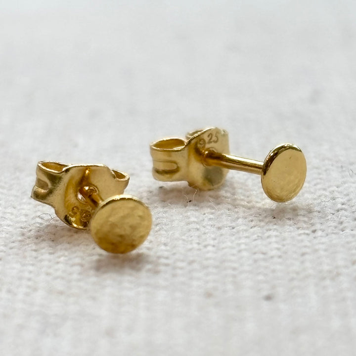 Gold plated sterling silver tiny disc stud earrings