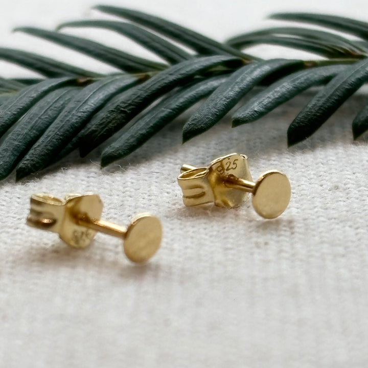 Gold plated sterling silver tiny disc stud earrings