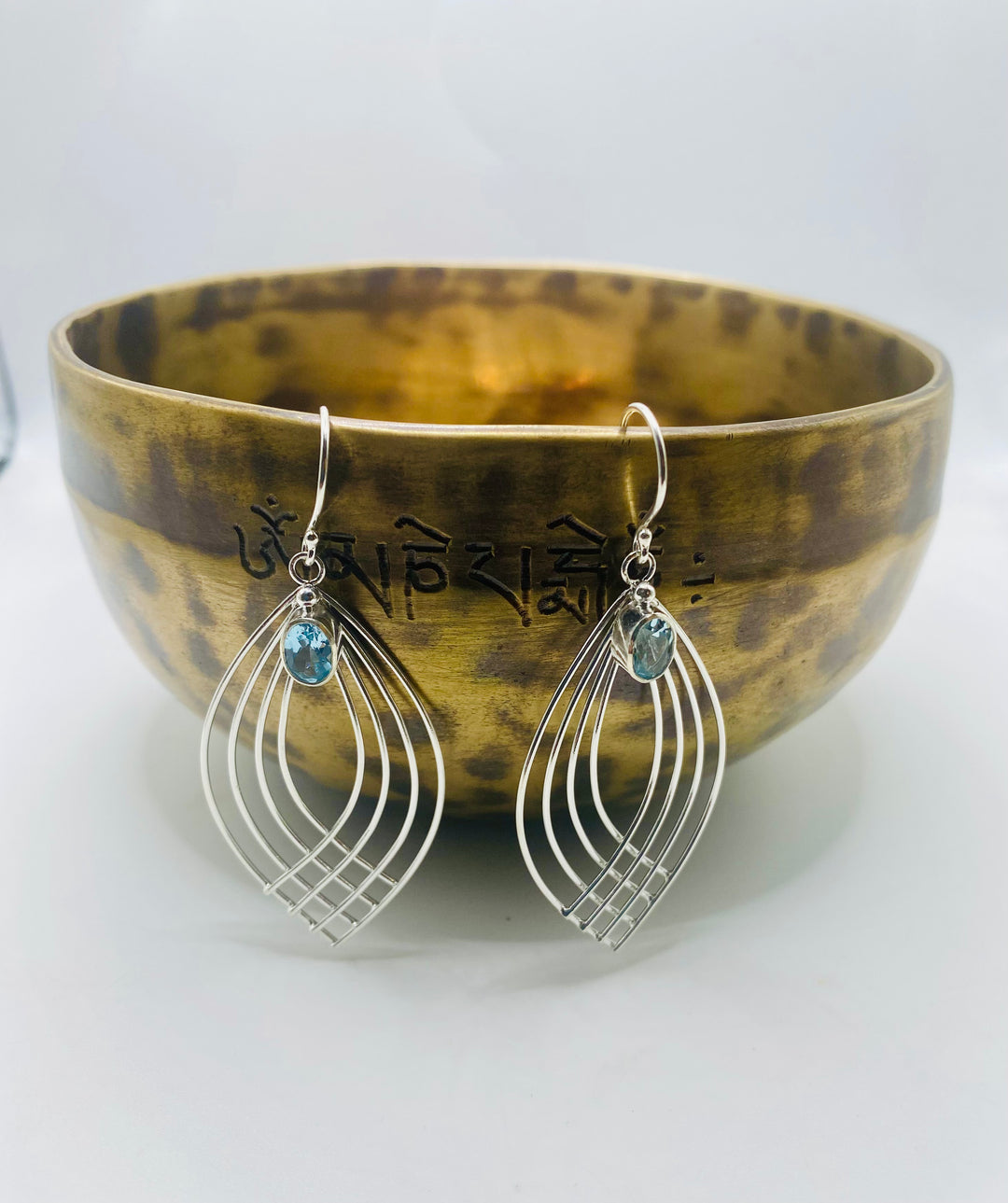 Blue Topaz Crossover Earrings